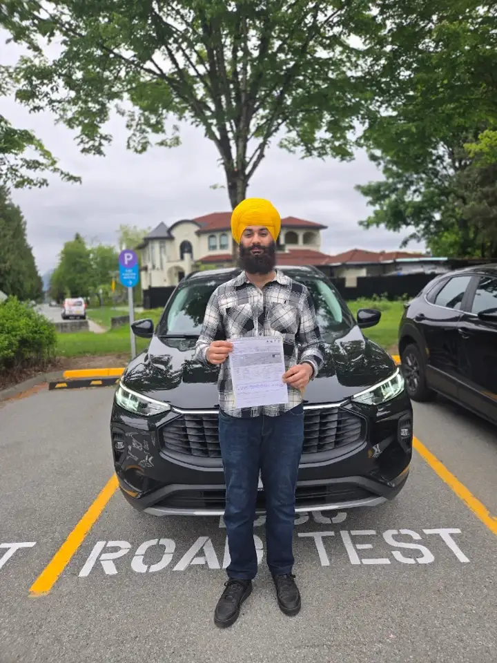 An ADS Driving School student after passing the road test